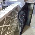 A flow grid is inserted into the filter grille/slot to directly measure airflow.