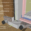 Right - The concrete basement wall is insulated on the interior with rigid foam; the footing detail is shown.