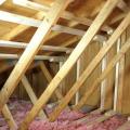 Right – An existing gable wall is reinforced with horizontal braces that butt up to the gable end wall and connect back to multiple trusses; retrofit studs make full contact with the wall and the compression blocks and are connected to the horizontal brac