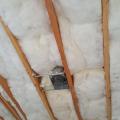 Wrong - Batt insulation is poorly installed leaving gaps along the ceiling.