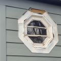 Wrong - Tape flashing around the window is poorly installed.