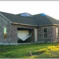 Wrong – Garage door failure due to positive pressures from hurricane force winds. 