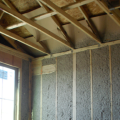Baffles allow ventilation under roof decking while keeping wind from blowing insulation back from the edges of an attic.