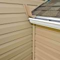 The diverter should be adequately sized to direct all of the water away from the wall and into the gutter.