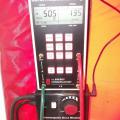 A manometer is used to measure pressure differentials between indoors and outdoors when testing whole-house air leakage.