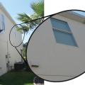 The air intake or exhaust grilles in this second-story soffit will be very difficult to safely access to measure airflow 
