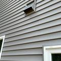Right - The kitchen exhaust duct termination is integrated aesthetically and functionally with the exterior cladding; however, the opening should be screened to keep out pests. 