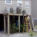 The air conditioner compressors are elevated above the base flood elevation. 