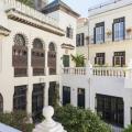 Light colors have been used on exterior walls and roofs to keep buildings cooler in hot climates for centuries, as shown by this traditional building in Morocco, built in the early 1800s