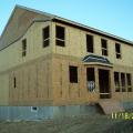 Install structural sheathing in exterior walls to resist wind pressure