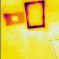 Wrong - IR image is showing that attic access is missing weather stripping.