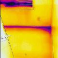 Wrong - This IR image is showing that cold air is entering the home at the window frame and the sill plate at the base of the wall.