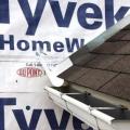 Install the house wrap. Cut house wrap to fit over diverter and tape top of cut wrap