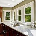 These interior storm windows have low-emissivity coatings to let in light while keeping out heat in the summer and keeping heat in in the winter 