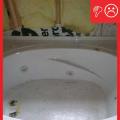 Wrong - Air barrier missing behind tub area