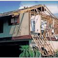 Failure at a gable end of a home under hurricane force wind conditions due to improper continuous load path design.