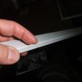 Exterior aluminum storm window showing weep channel, example 2