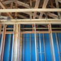 Wrong – No membrane or sealant is installed to air seal at the roof-truss assembly junction with the party walls 