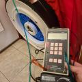 The hoses on this manometer are correctly connected with the red hose connected for the house with reference to outside and the green hose connected for the fan with reference to the house for a blower door test to show air leakage by pressure differences when the house is depressurized to about 50 Pascals.