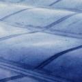 Wrong – This roof membrane on a low slope roof is fluttering and may fail because it is not fully adhered and deck seams below are not sealed, allowing air to leak up into the assembly while the membrane is pulled up due to negative pressures from wind