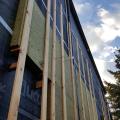 Right - Mineral Wool insulation is installed on the exterior of wall with furring strips.