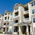 Fresh air intakes and exhaust vents are ducted to each unit in this multifamily building
