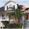 Newer home damaged from internal pressurization and inadequate connections, Hurricane Katrina. 