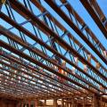 Open-web floor joists provide space for ducts between the floors of a two-story home.  