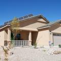 Deep overhangs and porches provide midday shade for most of the windows on this home in Albuquerque, NM.