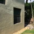 Crushed stone provides a pest-resistant perimeter around the foundation