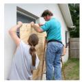 Right - Panels of 7/16-inch treated plywood are inexpensive but take time to install and are difficult to install on higher windows.