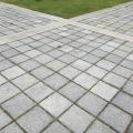 Porous surfaces like pavers allow water to pass through and percolate slowly into the soil 