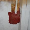 A fire-rated sealant "putty pad" is used to air seal an electrical outlet box