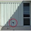 Residential glazing in wind-borne debris regions is required to resist test missile C or D; however, field investigations have shown that roof tile can penetrate shutters that comply with test missile D like this one, so test missile E compliant shutters are recommended near homes with tile roofs in wind-borne debris regions. 