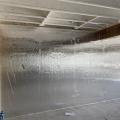 Right - Foil-faced polyisocyanurate rigid foam board is tightly installed and sealed against a concrete foundation wall prior to installing fibrous blanket insulation.