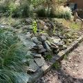 Riprap is placed on a hillside to stabilize the ground and reduce erosion