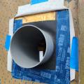 Right - After installing the EPDM gasket around the HRV duct, first the lower edge, then the sides of the gasket are taped; 11 of 14. 