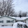 Drifting of snow led to heavy accumulation between the gables which required snow removal to reduce risk of roof collapse