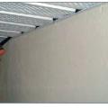 Soffits can be secured by caulking to the wall, sealing between each soffit panel and the wall channel, and screwing the wall channel to the soffit panels. 