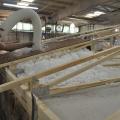 Southern Energy Homes worked with DOE researchers to develop an efficient way to dense-pack blown fiberglass into the low attics of manufactured homes.