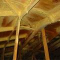 Spray foam adhesive provides an extra water resistant layer to the joints and seams on the inside of attics. 