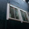 The tape window flashing here is integrated with the roller-applied weather-resistant barrier.