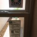 This home bears a DOE Zero Energy Ready Home label on its front window next to the ENERGY STAR window label.