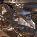 Wrong - The support strap for the duct is too tight and the radius of the turn is too sharp.
