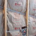 Faced fiberglass batt insulation incorrectly installed