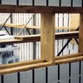 Window and door rough openings in the ICF wall are surrounded with pressure-treated wood