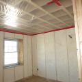 Right – Open-cell spray foam fills the cavity in this these double-stud walls