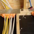 Air-seal wiring holes in top plates with foam.