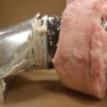 The inner liner of the flex duct is fastened to the collar with a tension tie, the connection is sealed with mastic, then the outer layer is pulled over and sealed with mastic or foil tape (Steven Winter Associates 2013).