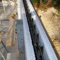 ICF bricks are stacked to form hollow walls that are reinforced with steel rebar before the concrete is poured in